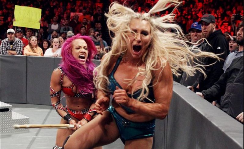 Sasha Banks and Charlotte Flair in a Falls Count Anywhere match on RAW