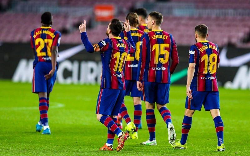Lionel Messi scored twice as Barcelona beat Huesca 4-1