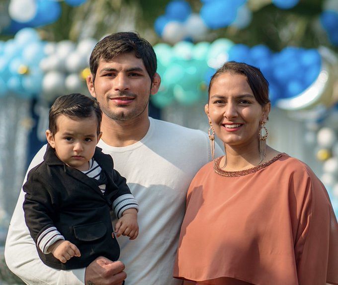 Geeta Phogat with husband Pawa Sahora and son Arjun (Image Credit: @geeta_phogat Twitter handle)