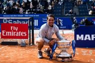 Rafael Nadal poses with the winner's trophy at the Barcelona Open in 2018
