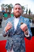 Did Conor McGregor lose to Dustin Poirier because of calf kicks alone, or was he out-struck on the feet?
