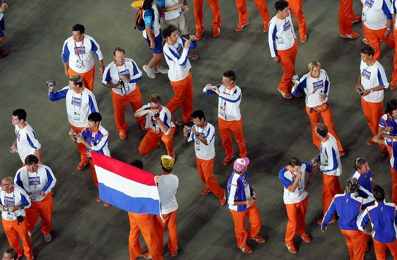 The Olympic flag is carried away during the closing ceremony of the Athens 2004 Summer Olympic Games