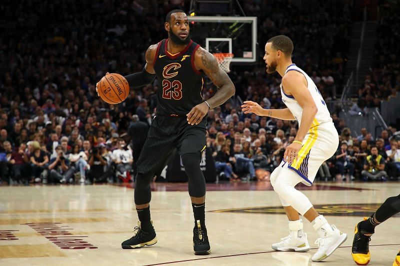 LeBron James (left) duels with Steph Curry (right)