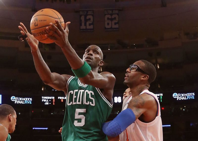 Kevin Garnett grabbing a rebound for the 2013 Boston Celtics.