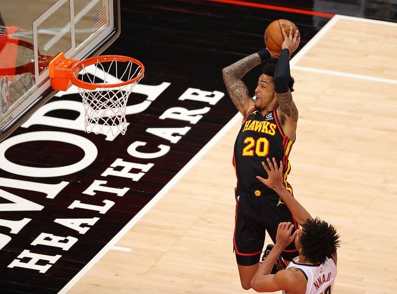 John Collins attacks the rim