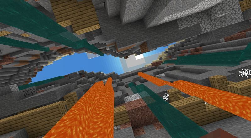 Looking up at lava, water, and mineshafts (Image via Minecraft)