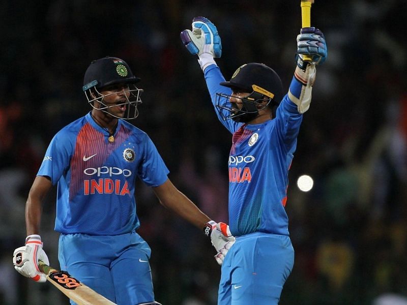 Dinesh Karthik (right) celebrates after winning the Nidahas Trophy final  for India in 2018.