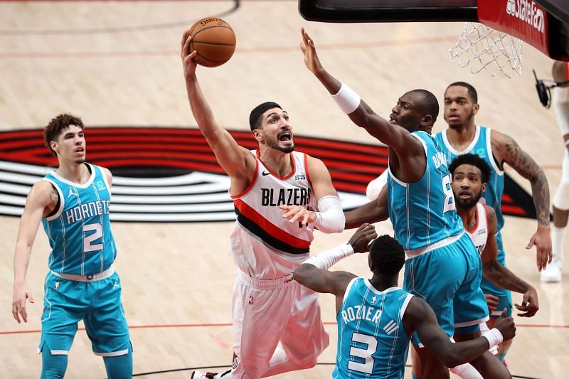 Portland Trail Blazers center Enes Kanter (in white)