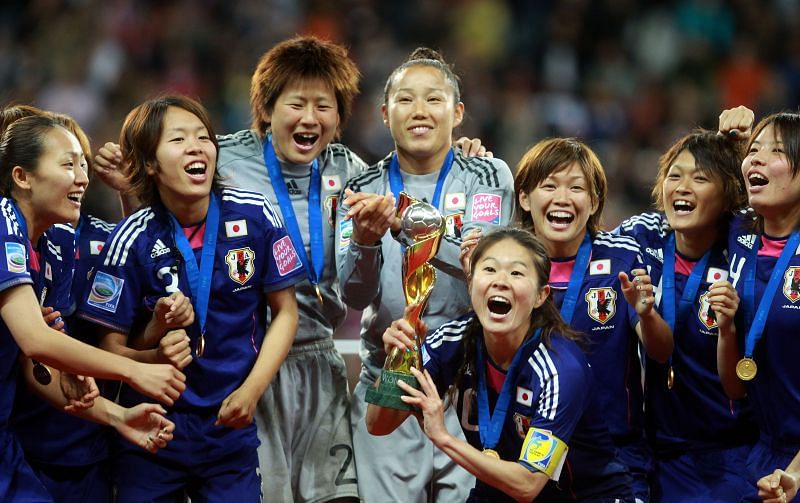 Homara Sawa, of Japan, lifts the trophy after the FIFA Women&#039;s World Cup Final in July 2011 in Germany