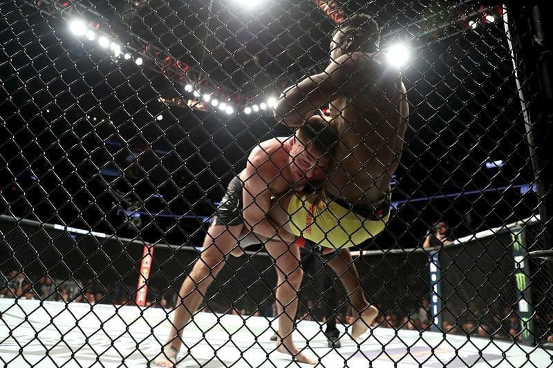 Stipe Miocic taking down Francis Ngannou.