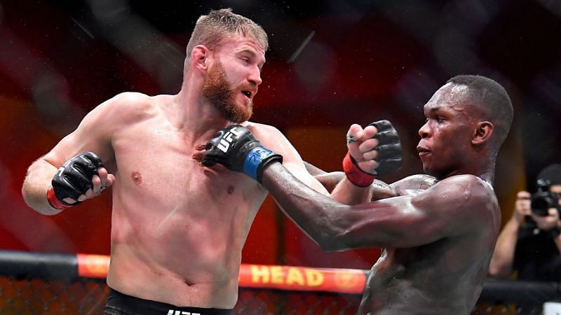 Jan Blachowicz (left); Israel Adesanya (right)