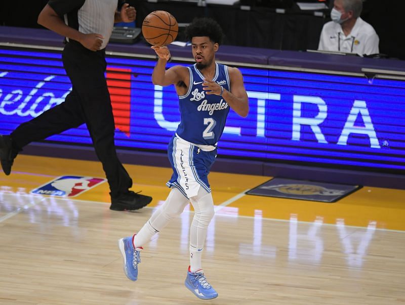 Quinn Cook #2 of the Los Angeles Lakers passes the ball while playing the Minnesota Timberwolves at Staples Center on December 27, 2020 (Photo by John McCoy/Getty Images)