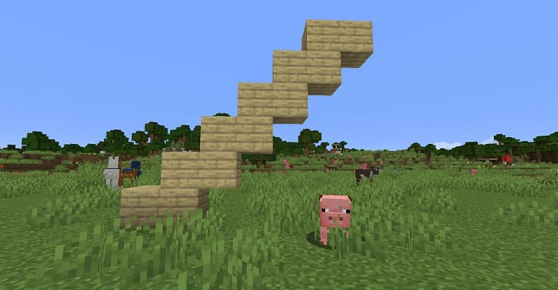 A structure built out of planks that is tall enough to earn the &quot;When Pigs Fly&quot; achievement on Minecraft Bedrock Edition. (Image via Minecraft)