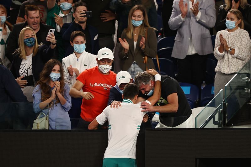 Novak Djokovic celebrates with his team after winning the 2021 Australian Open