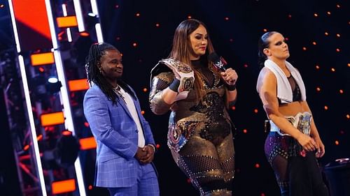 Reginald along with Nia Jax & Shayna Baszler on WWE RAW