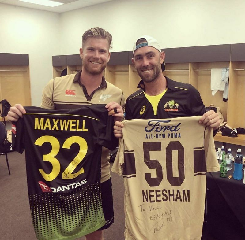 Jimmy Neesham and Glenn Maxwell exchange signed jerseys