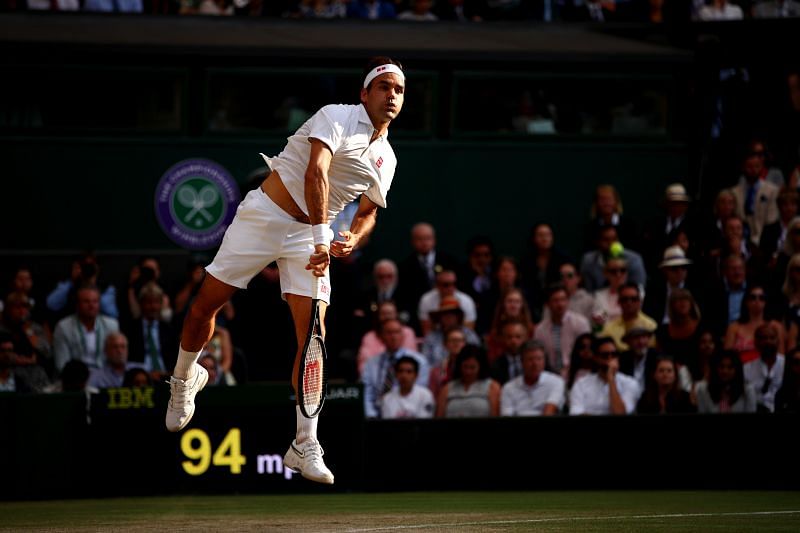 Roger Federer serves at 2019 Wimbledon
