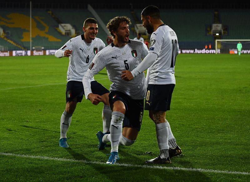 Manuel Locatelli celebrates his goal with Lorenzo Insigne and Marco Veratti.