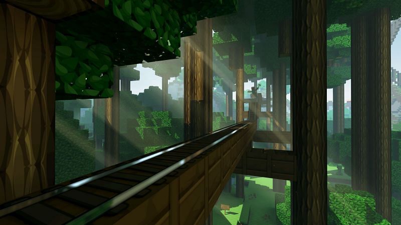 A railway built up in the sky among trees in Minecraft. (Image via wallup.net)