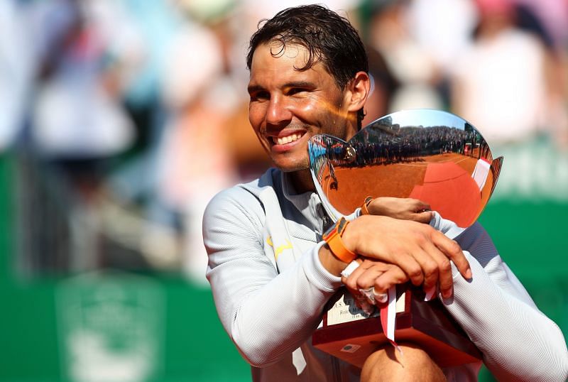 Rafael Nadal with the winner's trophy after winning the Monte Carlo Masters in 2018