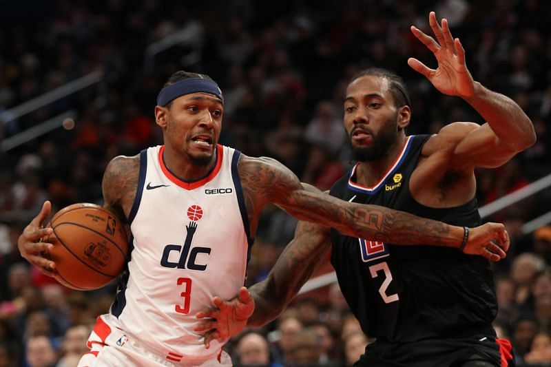 Bradley Beal #3 of the Washington Wizards drives in the lane past Kawhi Leonard #2 of the LA Clippers.
