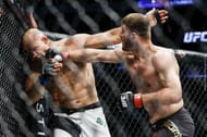 Stipe Miocic corners Dos Santos before knocking him out.