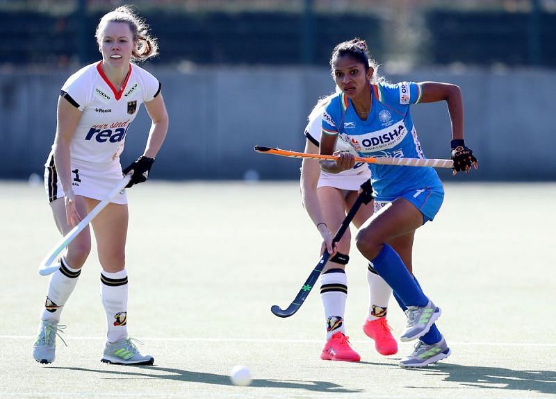 India&#039;s Navjot Kaur (in blue) in action against Germany