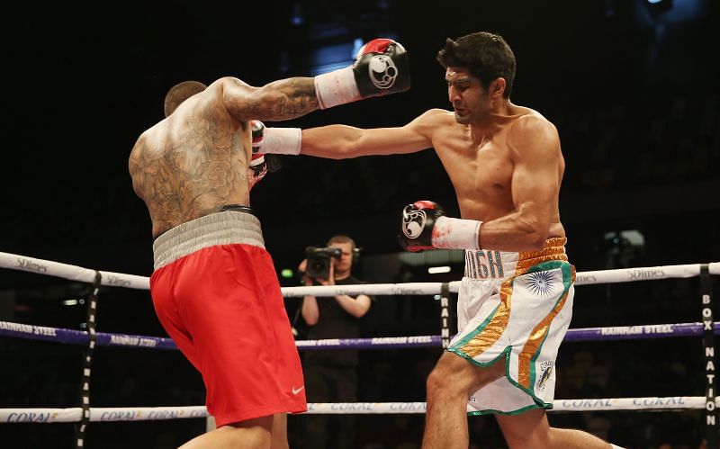 Vijender Singh (right) won a Bronze medal at the 2008 Beijing Olympics