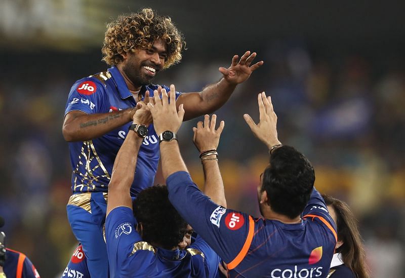 Lasith Malinga celebrates with his teammates after helping Mumbai to their fourth IPL title in 2019.