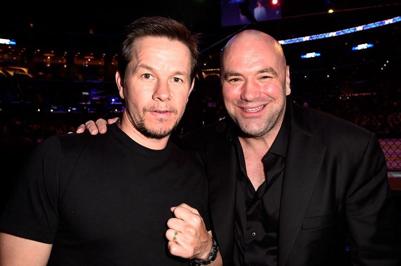 Mark Wahlberg and Dana White hand out during a UFC event