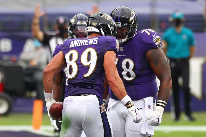 Orlando Brown and Mark Andrews celebrate against the Cincinnati Bengals on Oct. 11, 2020.