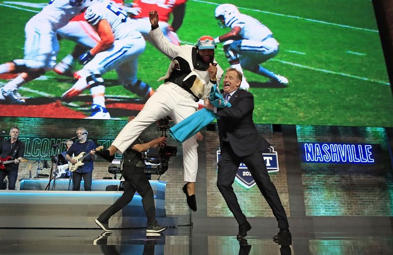 Christian Wilkins celebrates with Roger Goodell during the 2019 NFL Draft