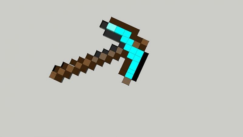 Diamond pickaxe crafted using three diamonds and two sticks (Image via Minecraft)