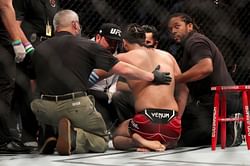 Jorge Masvidal's coach reacts to 'Gamebred's' devastating KO loss against Kamaru Usman at UFC 261