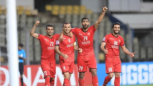 Persepolis FC players Isa Al Kasir, Jalal Hosseini, Shahriyar Moghanloo, and Siamak Nemati (from left to right) celebrate after scoring against FC Goa in their 2021 AFC Champions League match (Image Courtesy: AFC website)