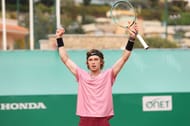 Andrey Rublev celebrates after beating Casper Ruud