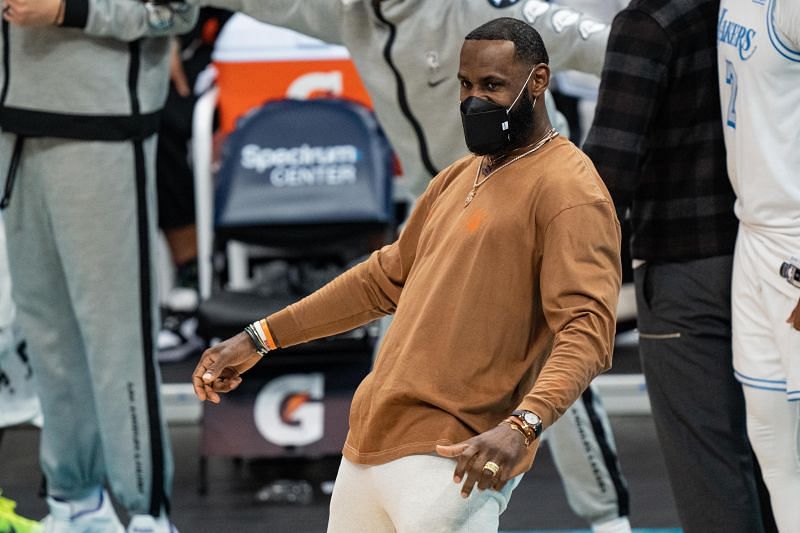 LeBron James reacts after a dunk by Kyle Kuzma.