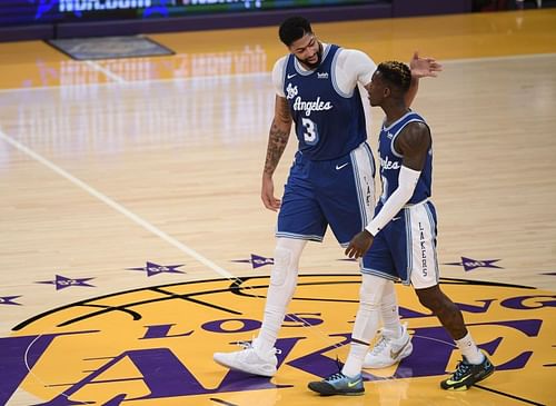 LA Lakers' Anthony Davis #3 celebrates a lead over the Denver Nuggets with Dennis Schroder #17