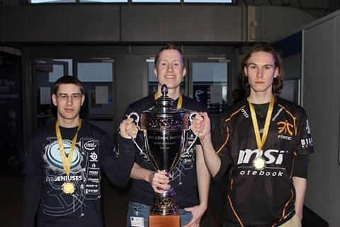 Azael and his EG teammates with the Intel Extreme Masters World Championship trophy (Image via ESL Archives)