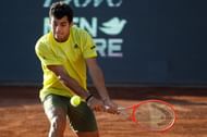 Cristian Garin plays a backhand