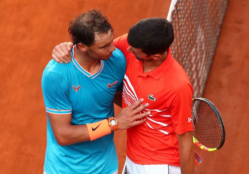 Rafael Nadal and Novak Djokovic embrace after their final at Rome