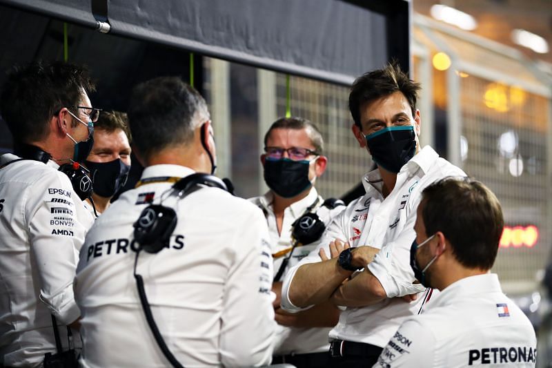 Mercedes Team Principal Toto Wolff talks with his team members in the pit lane during qualifying of the 2021 Bahrain GP. Photo: Mark Thompson/Getty Images.