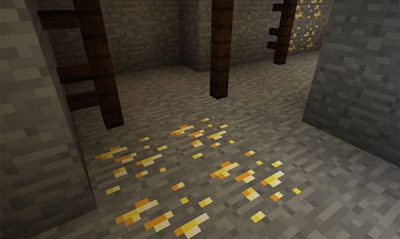 Golden ore while mining (Image via gamingdebugged)