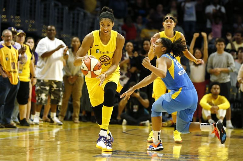 Candace Parker #3 of the Los Angeles Sparks drives around forward Gabby Williams #15 of the Chicago Sky