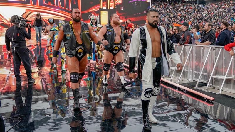 Andrade with several other stars at WrestleMania 35 