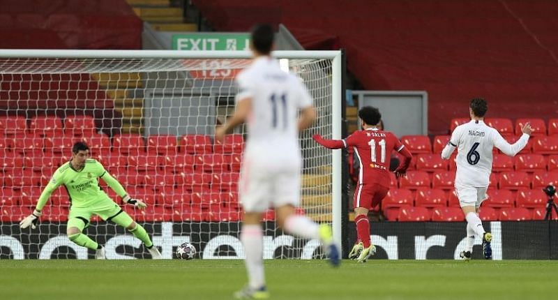 Thibaut Courtois denies Mohamed Salah and Liverpool in the second minute