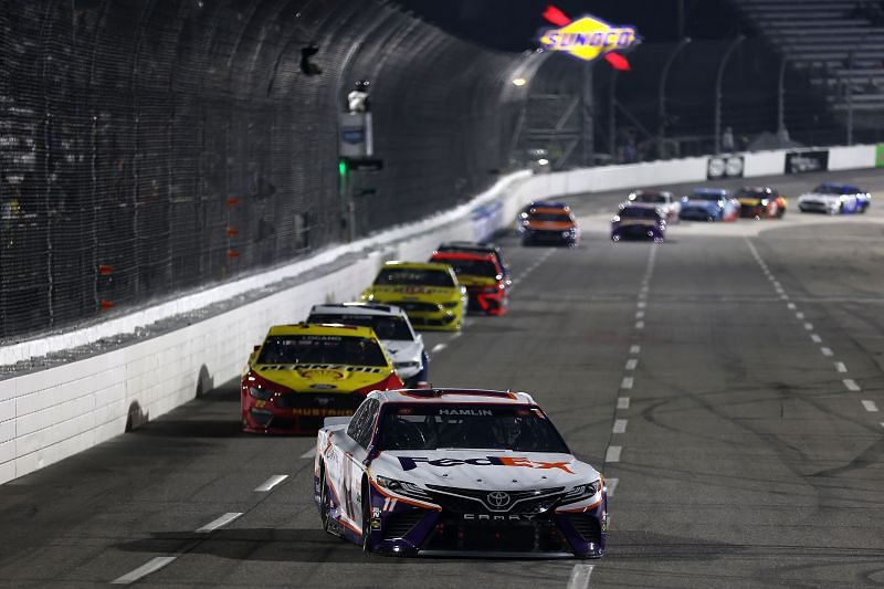 Denny Hamlin leads the Blu-Emu Maximum Pain Relief 500. Photo by James Gilbert/Getty Images