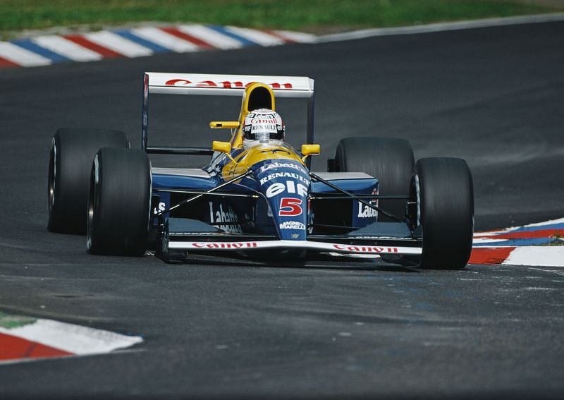 Nigel Mansell behind the wheel of the Williams FW14B at the Hockenheimring Circuit in Germany. (Photo by Pascal Rondeau/Allsport/Getty Images)