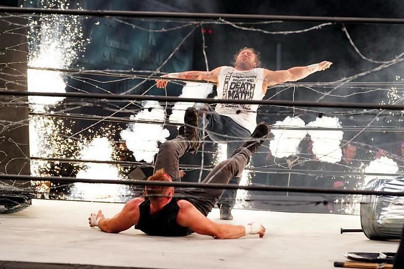Kenny Omega vs Jon Moxley in Exploding barbed wire deathmatch, AEW Revolution.