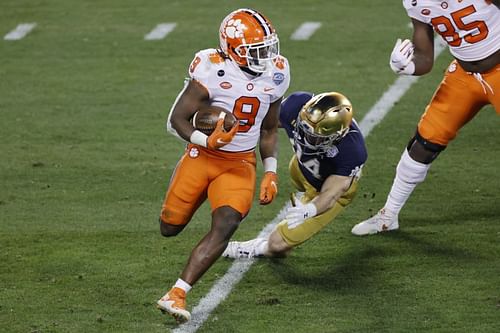 Clemson running back Travis Etienne breaks free against Notre Dame in the ACC Championship.